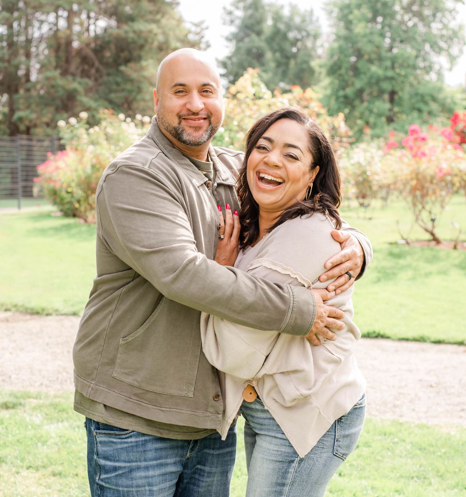 Candid moments captured during an outdoor photoshoot showing playful interactions.