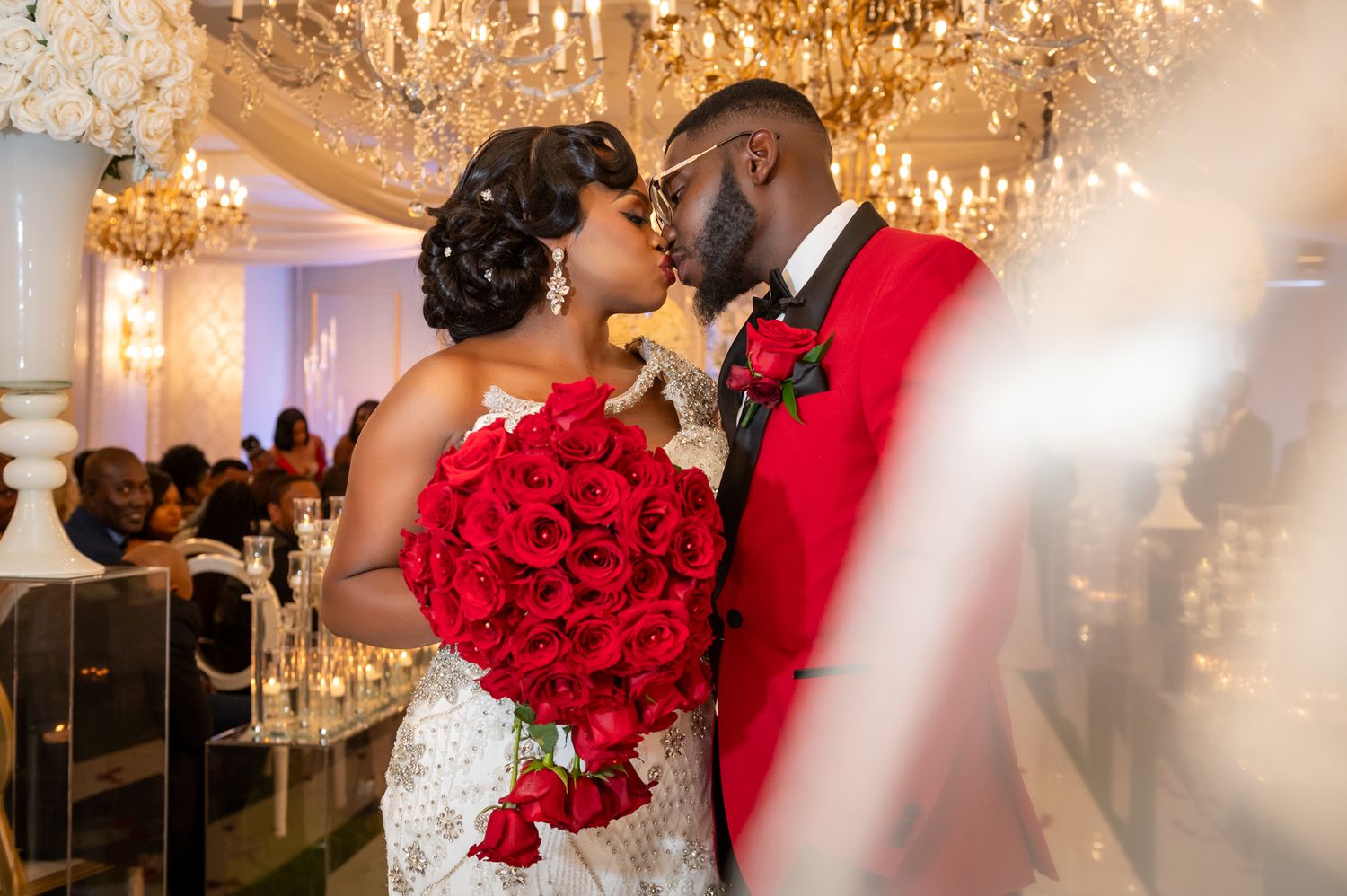 Editorial-style image of the couple under tropical foliage, taken by a Fort Lauderdale wedding photographer.