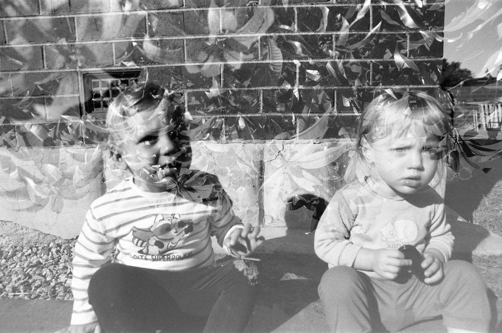 Joyful family photography session in Perth, with twins and parents playing outdoors