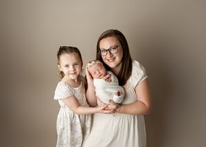 Studio photography collection featuring gentle neutral tones and white dresses creating an elegant and timeless look.