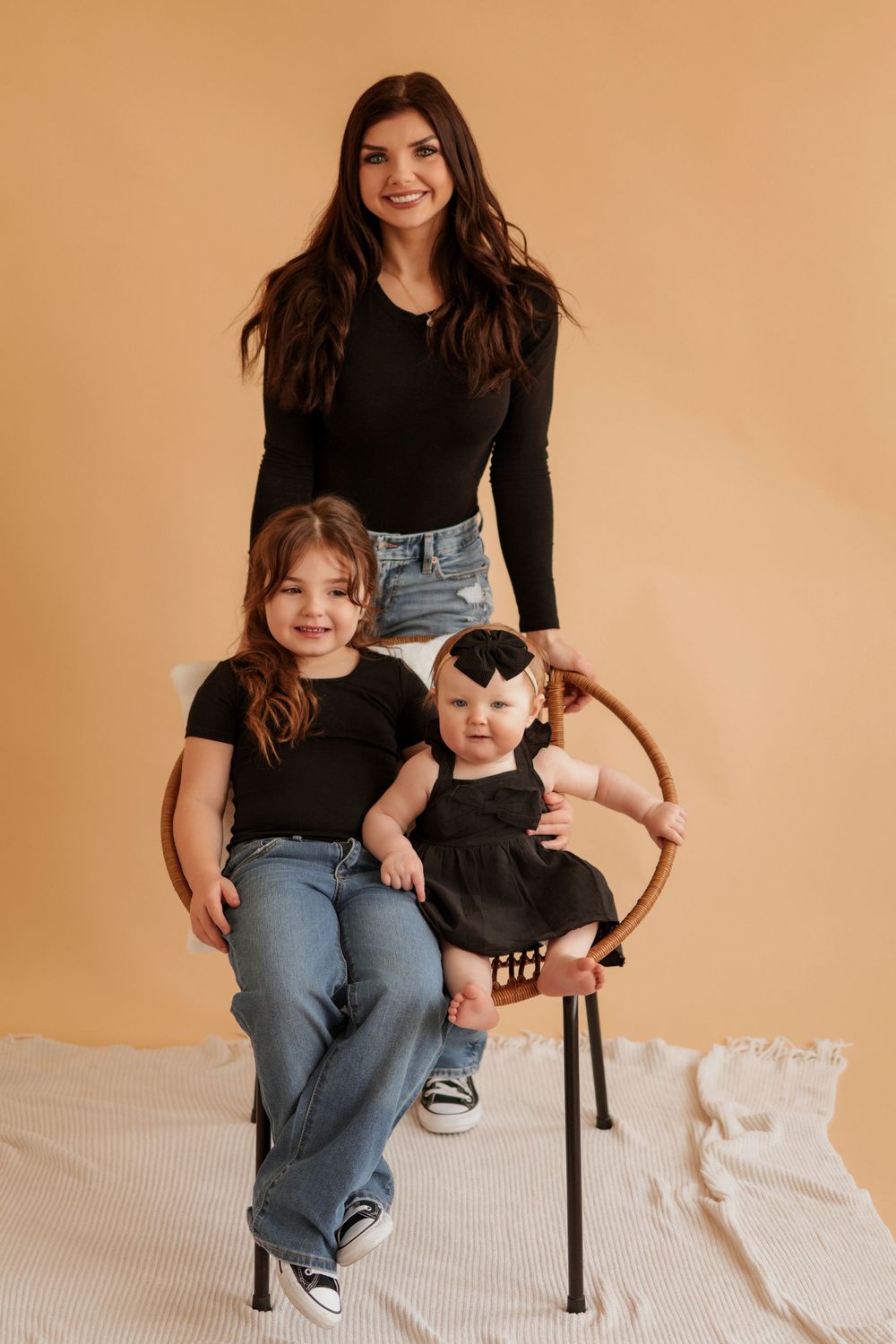 Candid lifestyle portraits taken against a neutral beige background.