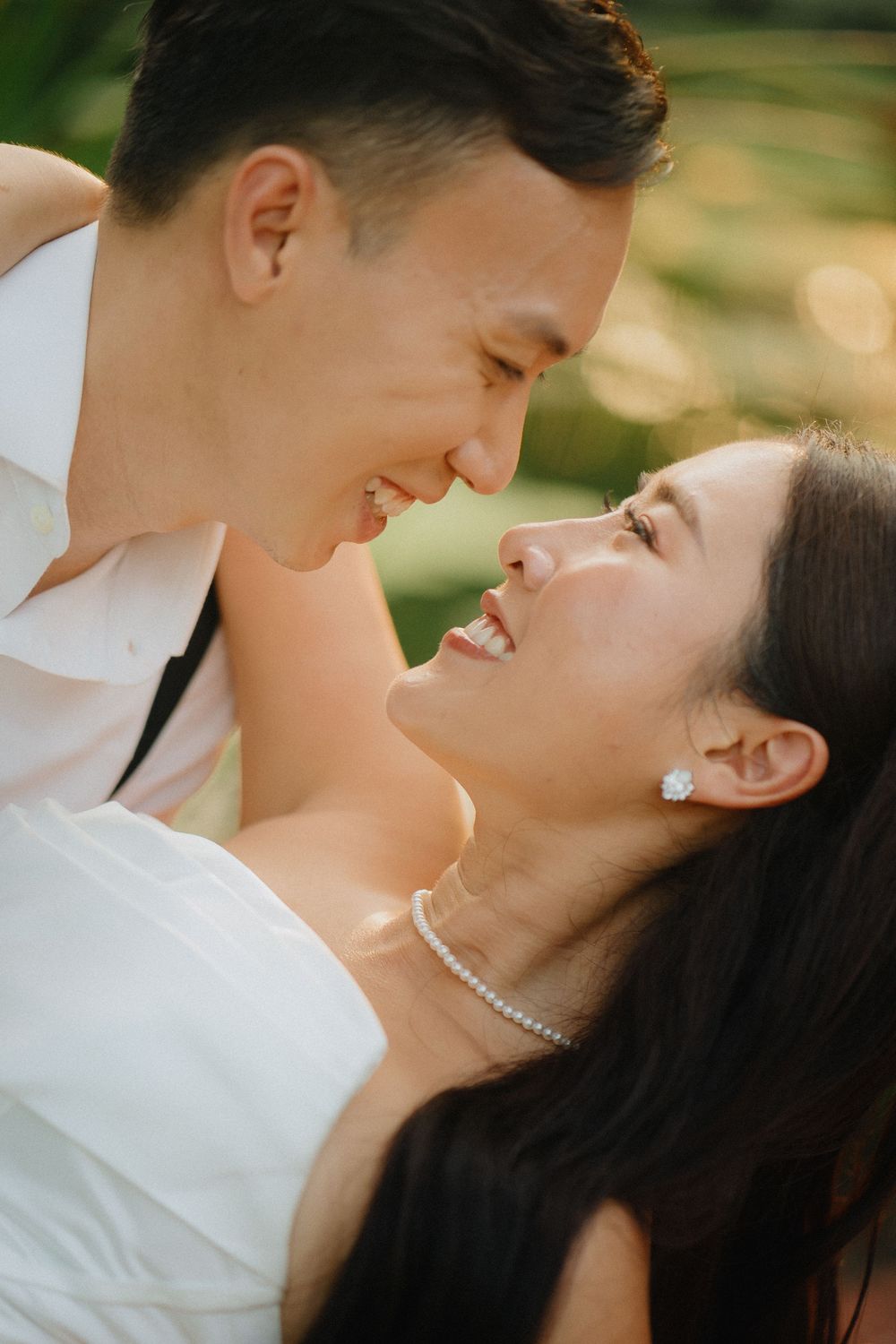A romantic couple shares tender moments in a series of intimate outdoor portrait photographs with soft natural lighting.
