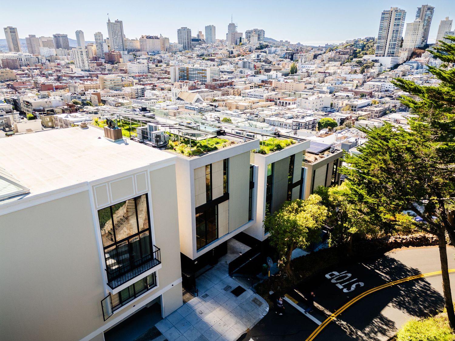 San Francisco skyline view from residential balconies with modern architecture and urban landscape in background.
