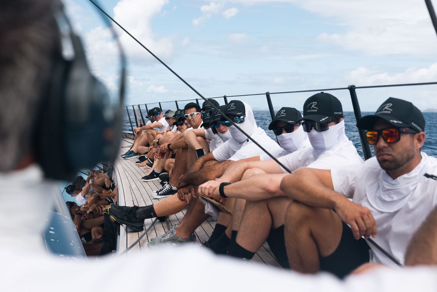 A series of people enjoying a boat ride together on the water during a sunny day.
