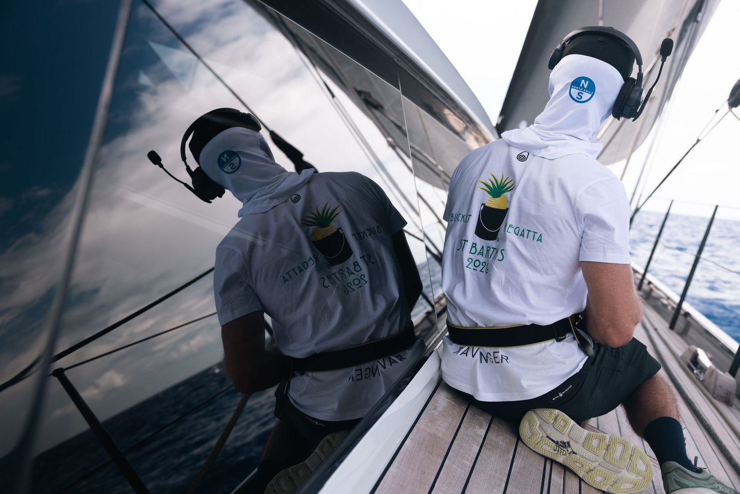 A series of images showing workers cleaning and maintaining a boat deck with pressure washing equipment and brushes.