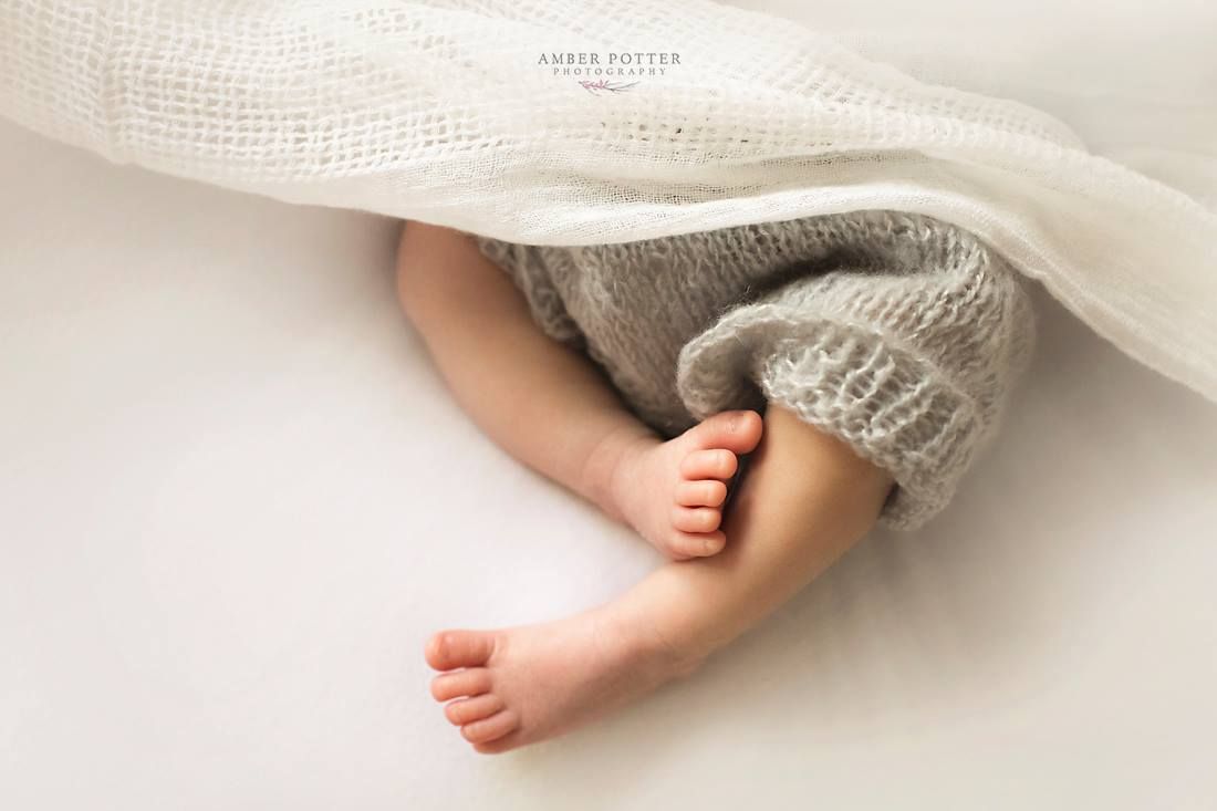 Tender family moment during newborn session in Springfield MO
