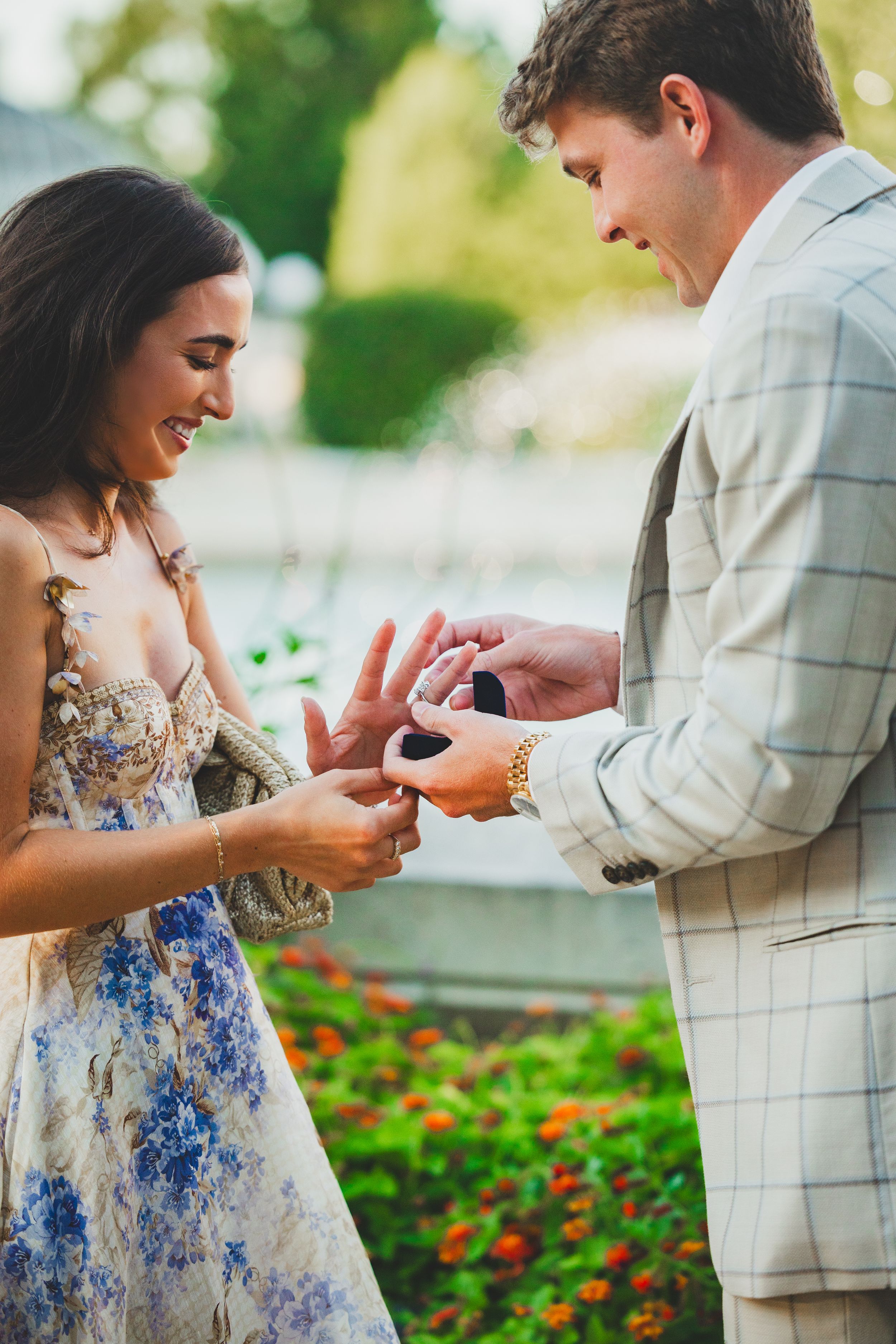 Joyful reaction of bride-to-be during surprise proposal at Bartholdi Fountain