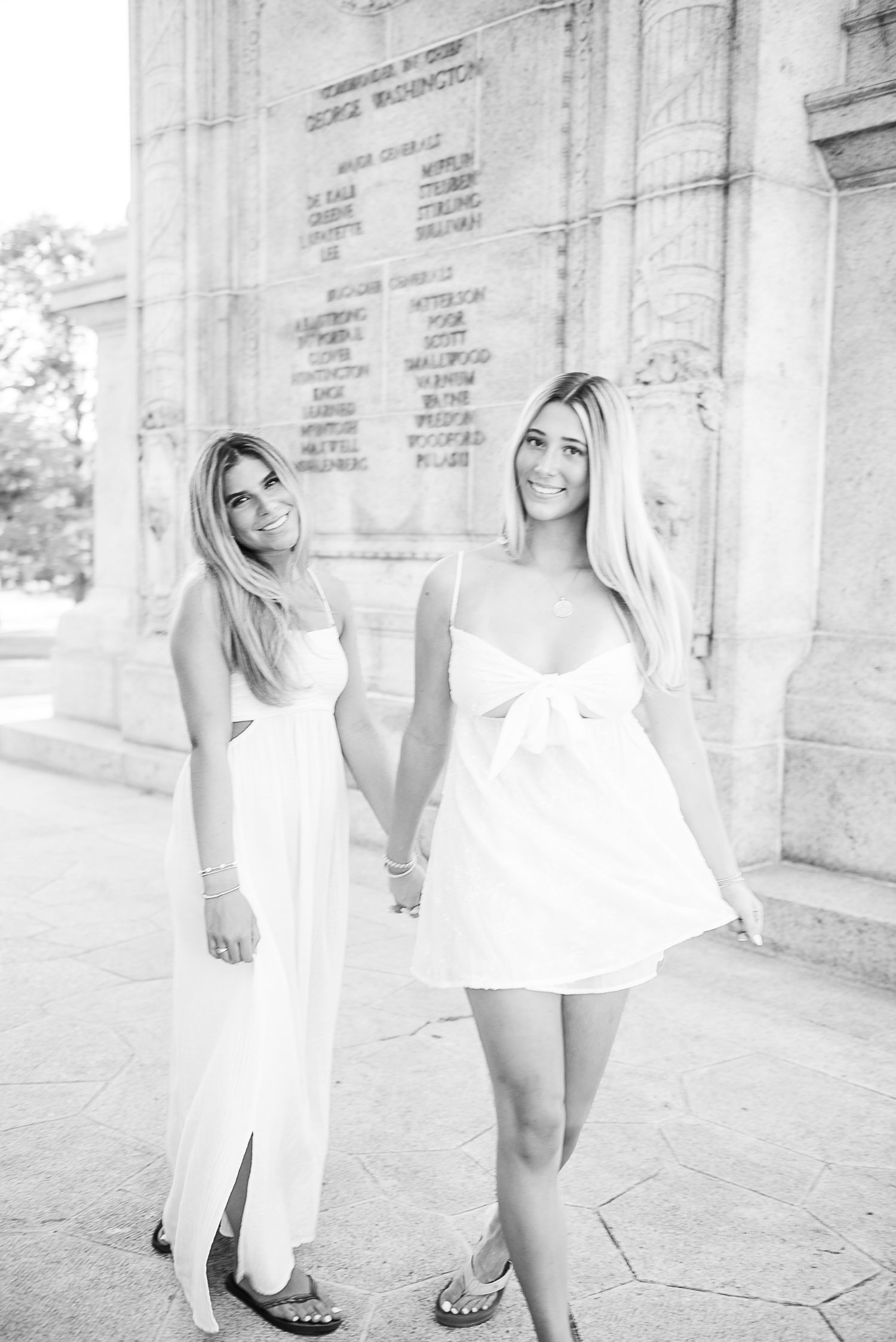 A series of black and white fashion photographs showing someone posing in white clothing against a stone wall backdrop.