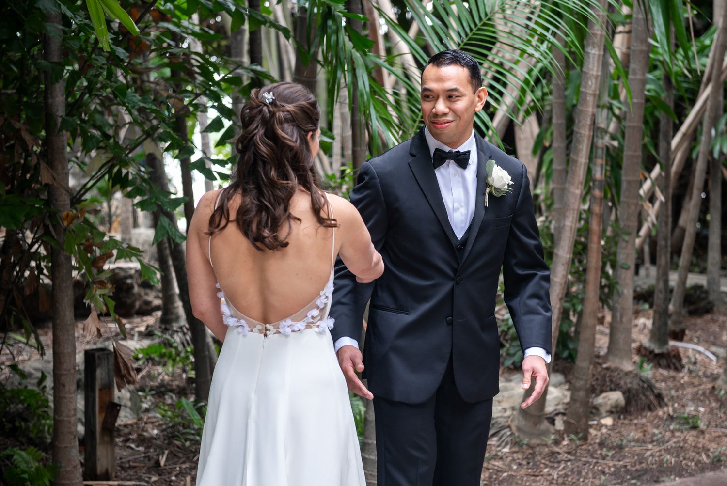 Samantha walks down the aisle at Bahia Mar, glowing in the South Florida sun – a moment frozen by Palm Beach wedding photographers.