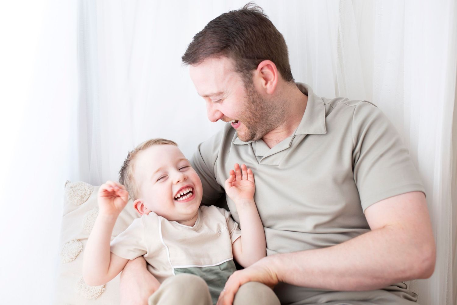 Newborn Family photoshoot dad and son by Little Wonderland Photography Widnes Cheshire