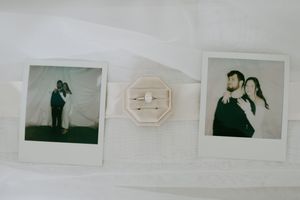 Collection of romantic photographs arranged in a row on a white surface.