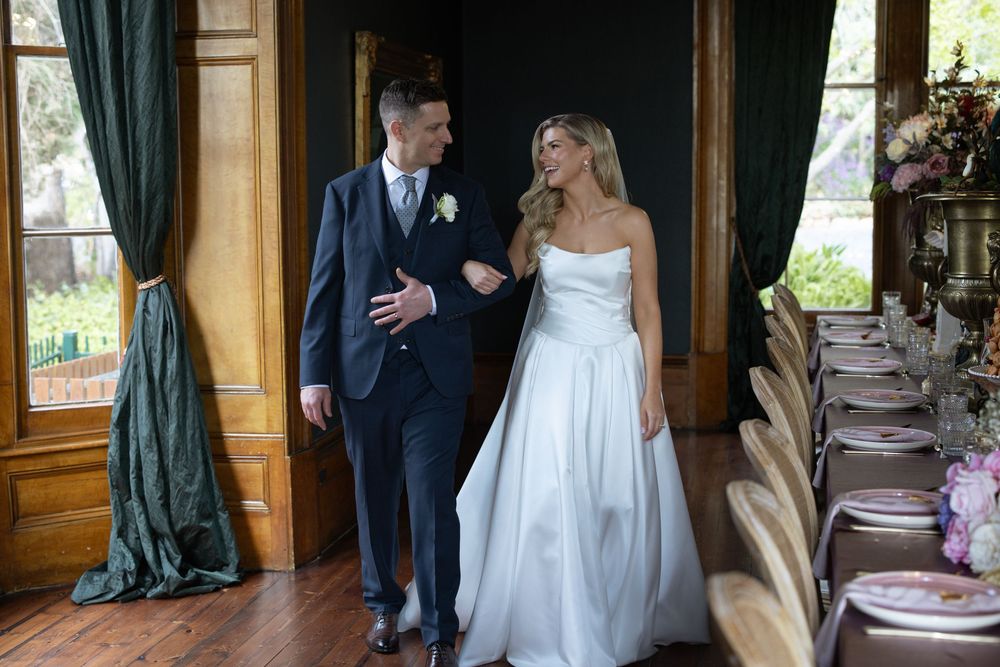 Wedding ceremony moments captured in a rustic wooden gazebo interior with elegant decor.