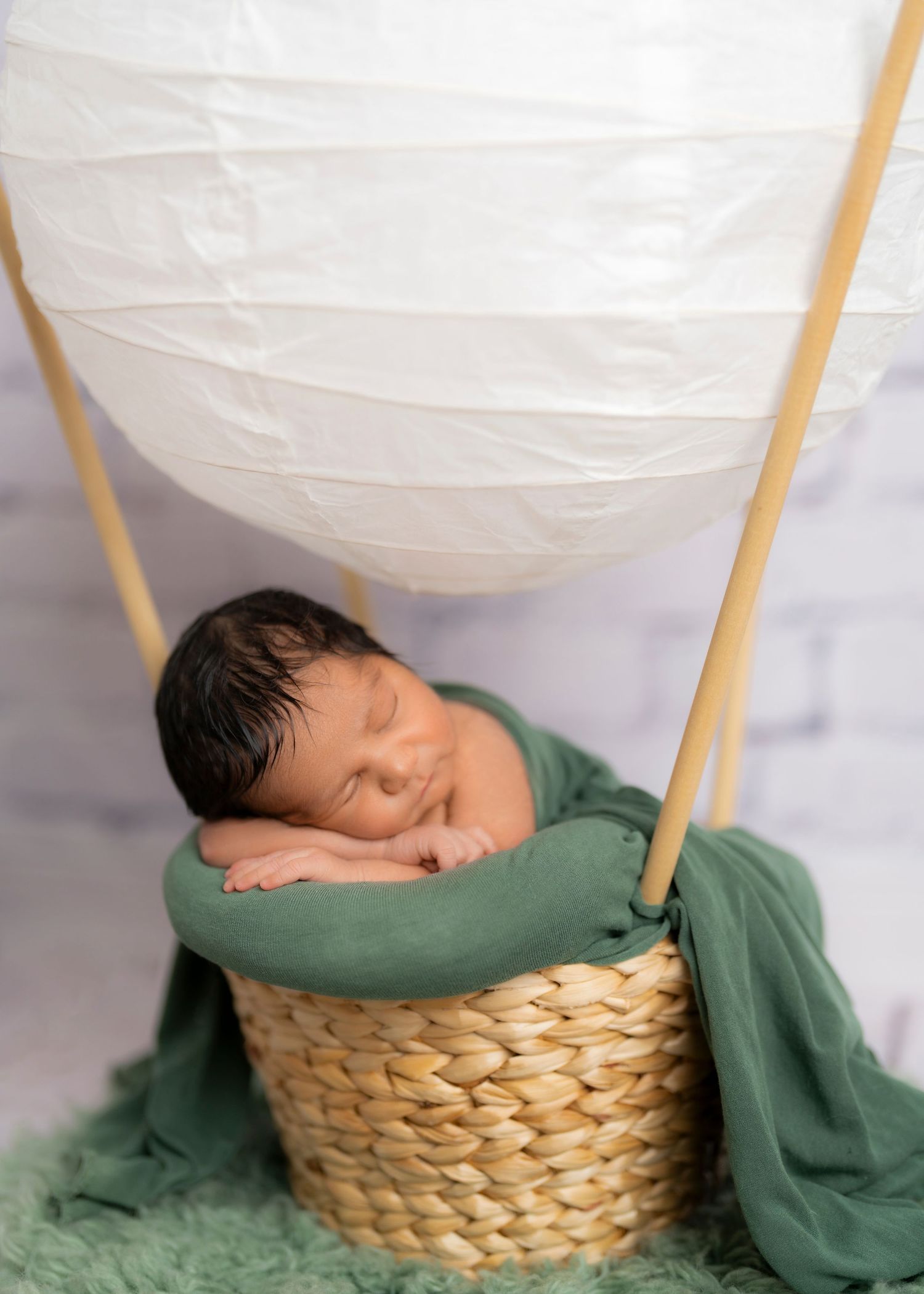 newborn baby boy in a hot air balloon