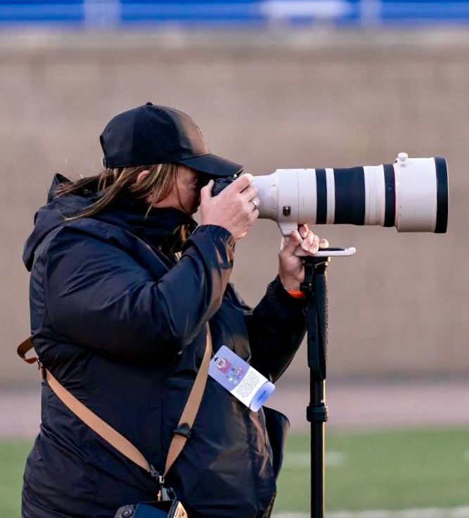 Image of Sally Lombard on the sidline of a football game in South Dakota