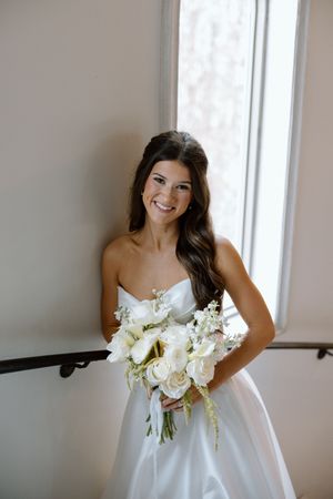 A series of five bridal portraits showing a person in white holding a bouquet of white flowers against a light background.