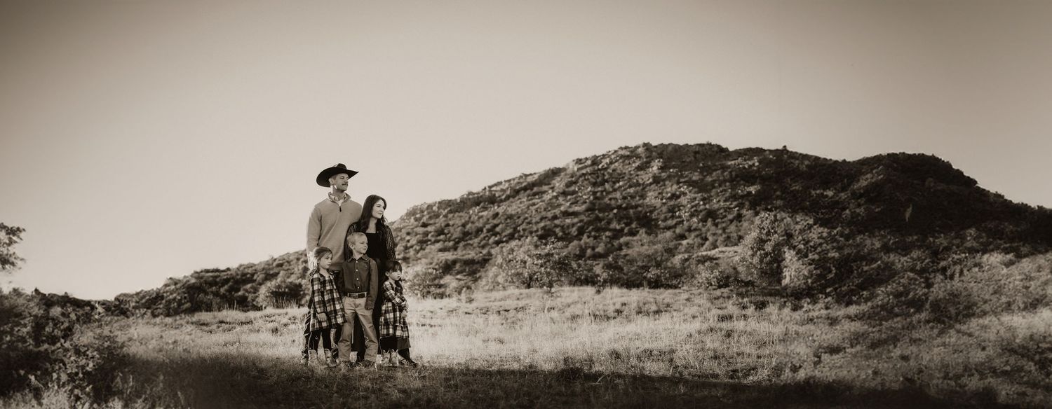 Wichita Wildlife Mountains Refuge Paul Family Photoshoot Session, siblings, mother father, fields, mountain, beautiful skies