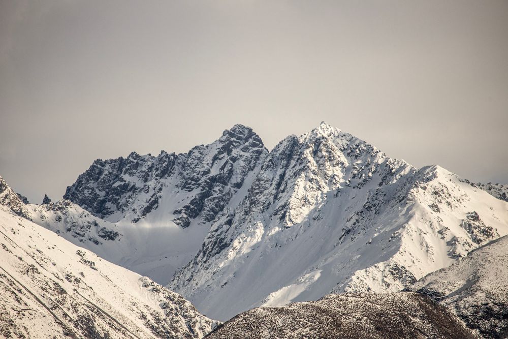 snowy-southern-alps-mountains-moody-skies-whisky-creek.jpg