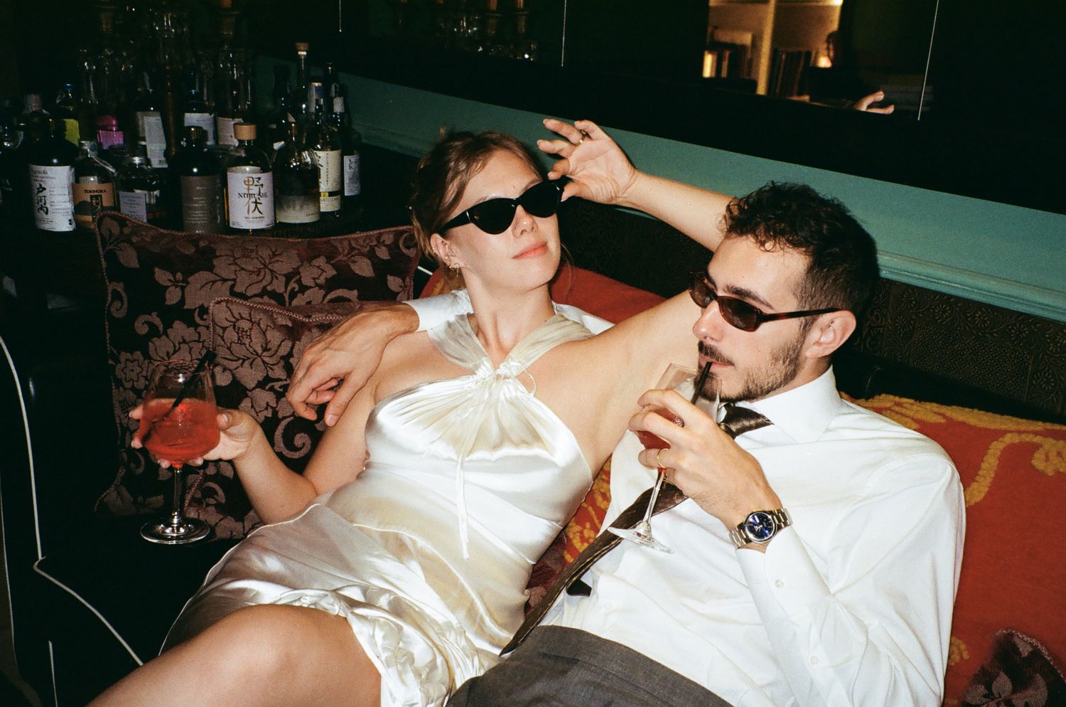 Reception scene captured with creative flash to emphasize energy, texture, and the modern editorial aesthetic.