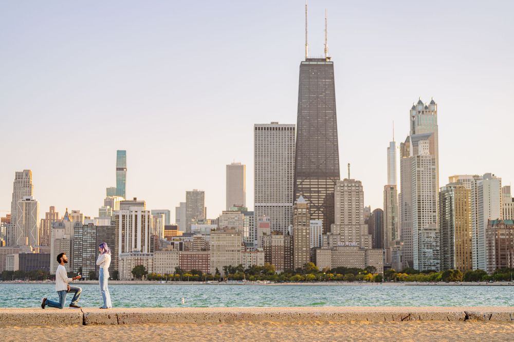 Chicago skyline panorama viewed from North Avenue Beach with Lake Michigan in the foreground.