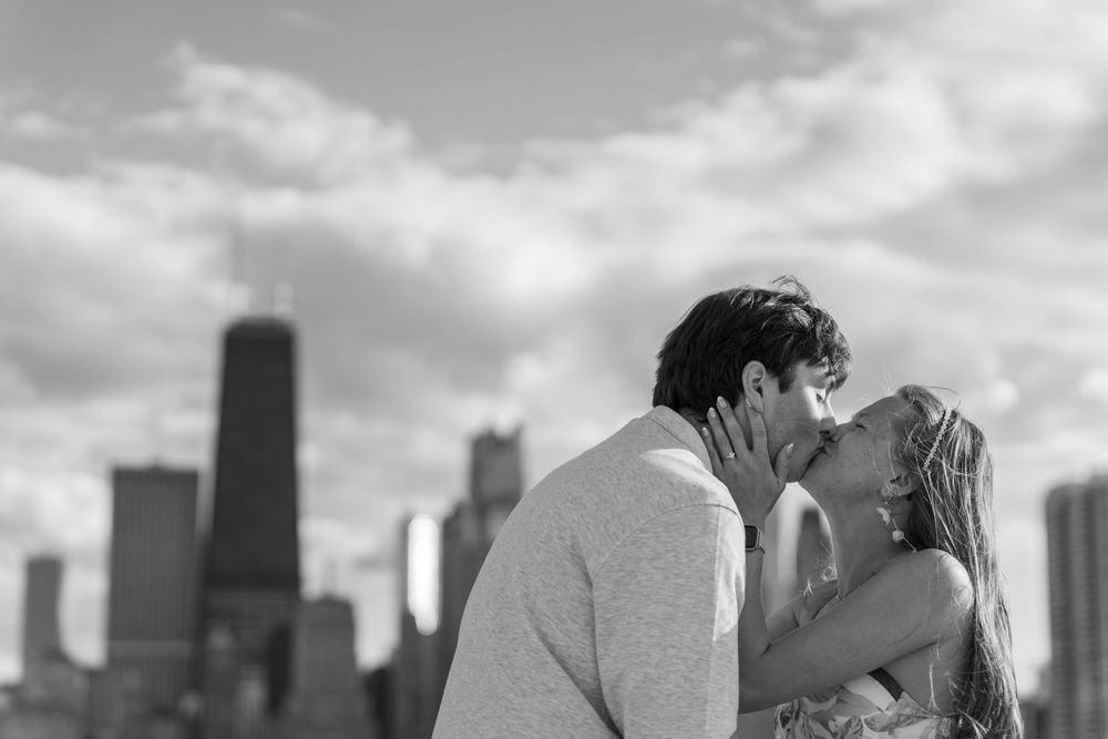 Black and white cityscape proposal photos with Chicago's iconic skyline as backdrop.