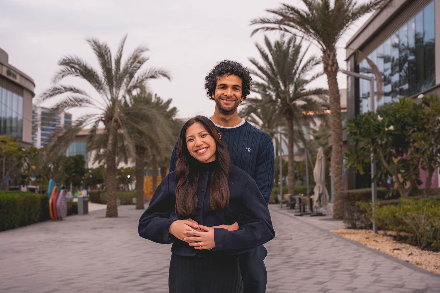A young couple sharing a moment in  Abu Dhabi park.