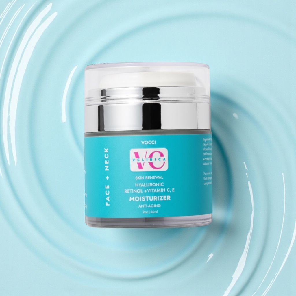 Beauty product jars arranged on swirling light blue background.