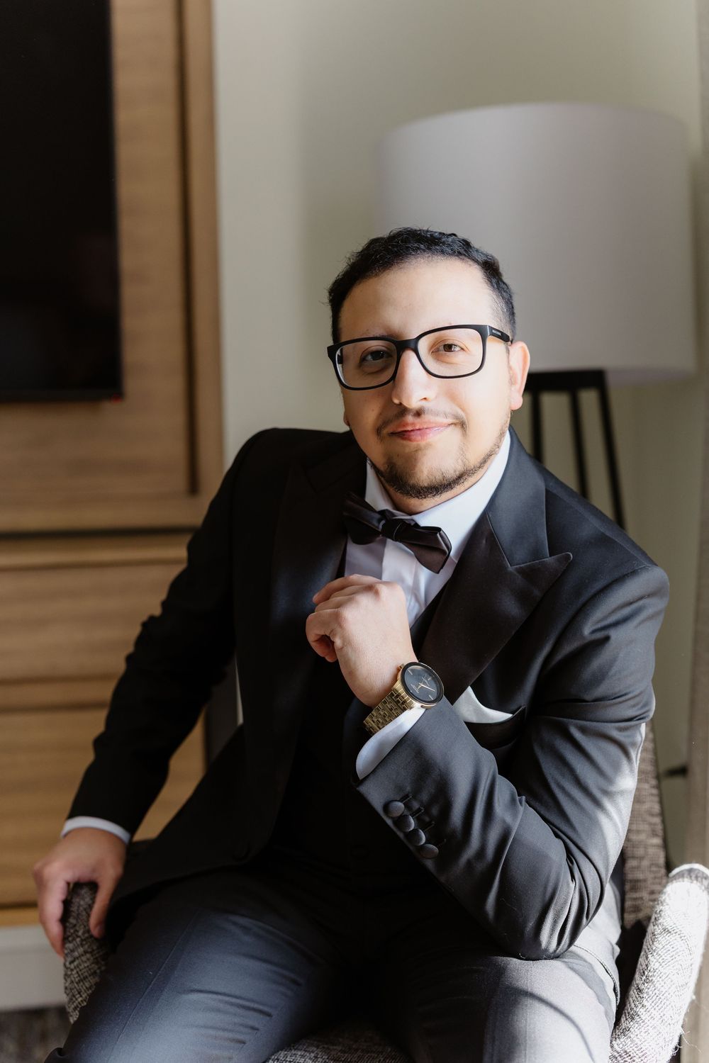 Series of photos showing someone in a dark suit and glasses resting their chin on their hand thoughtfully.