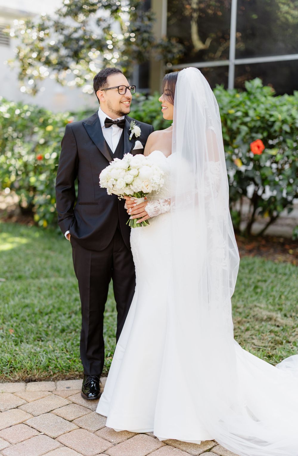 A romantic wedding sequence showing three progression shots of a couple in a garden setting.