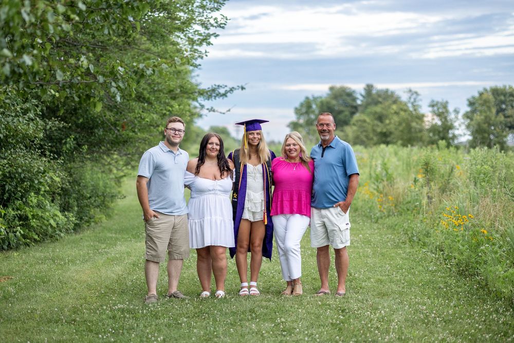 Central, IL Photographer captures a family during a photo session at Centennial Park in Springfield, IL