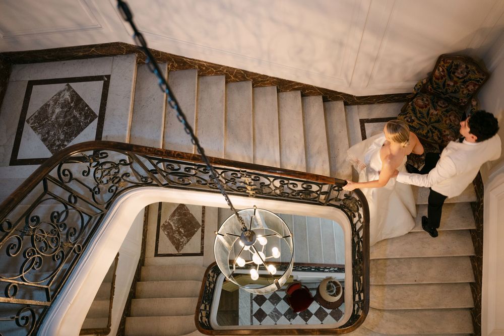 A series of ornate wrought iron staircase railings with decorative scrollwork patterns photographed from different angles.