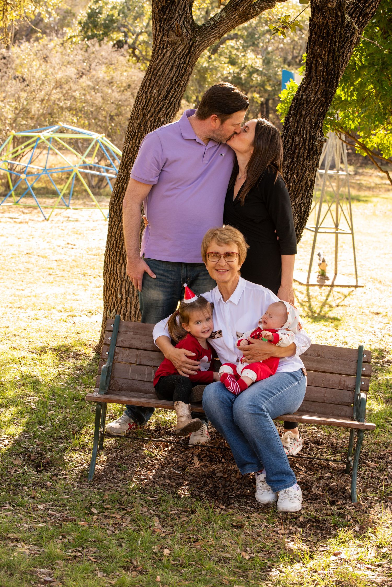 A collage of candid family moments on a wooden bench under a tree in a sunlit outdoor setting.