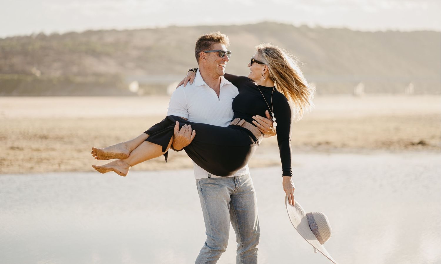 Couple in love surrounded by golden fields for their engagement shoot at Pretoria in South Africa