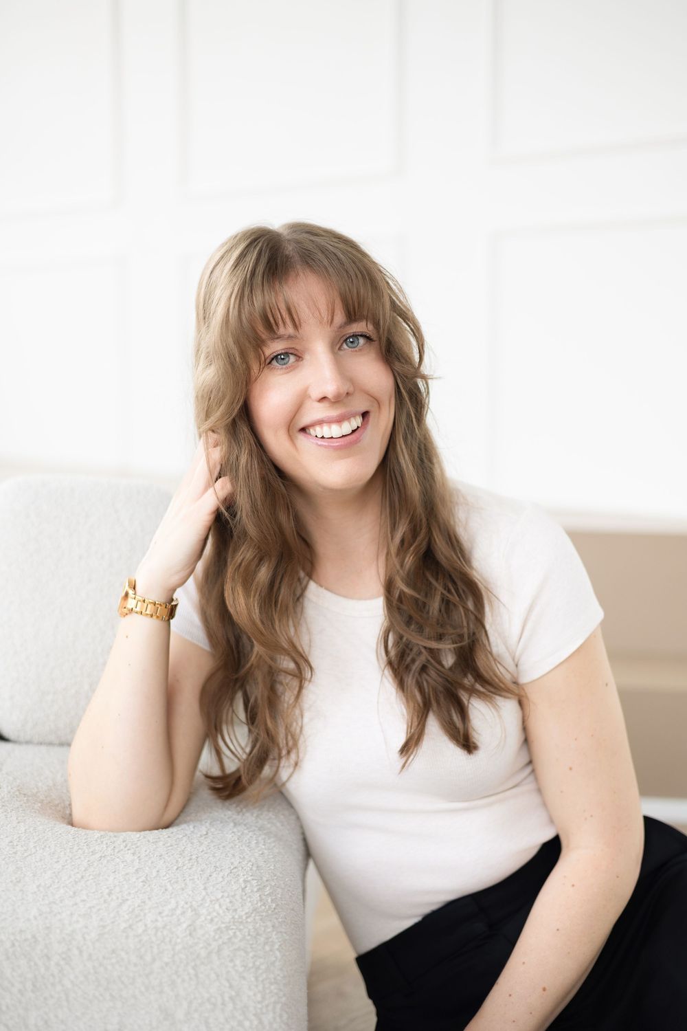 Portrait of Darian Fournie, non-profit consultant, against a clean neutral backdrop in London, Ontario