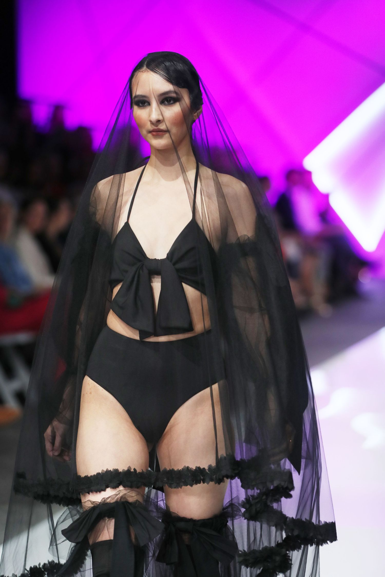 Beautiful photography by Brisbane photographer Tito Media of fashion model Juliette Russo on the catwalk at Brisbane Fashion Festival.
