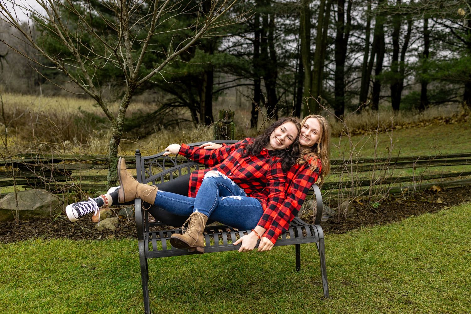 A creative photo sequence showing someone in casual clothing falling backwards off a ledge into grass.