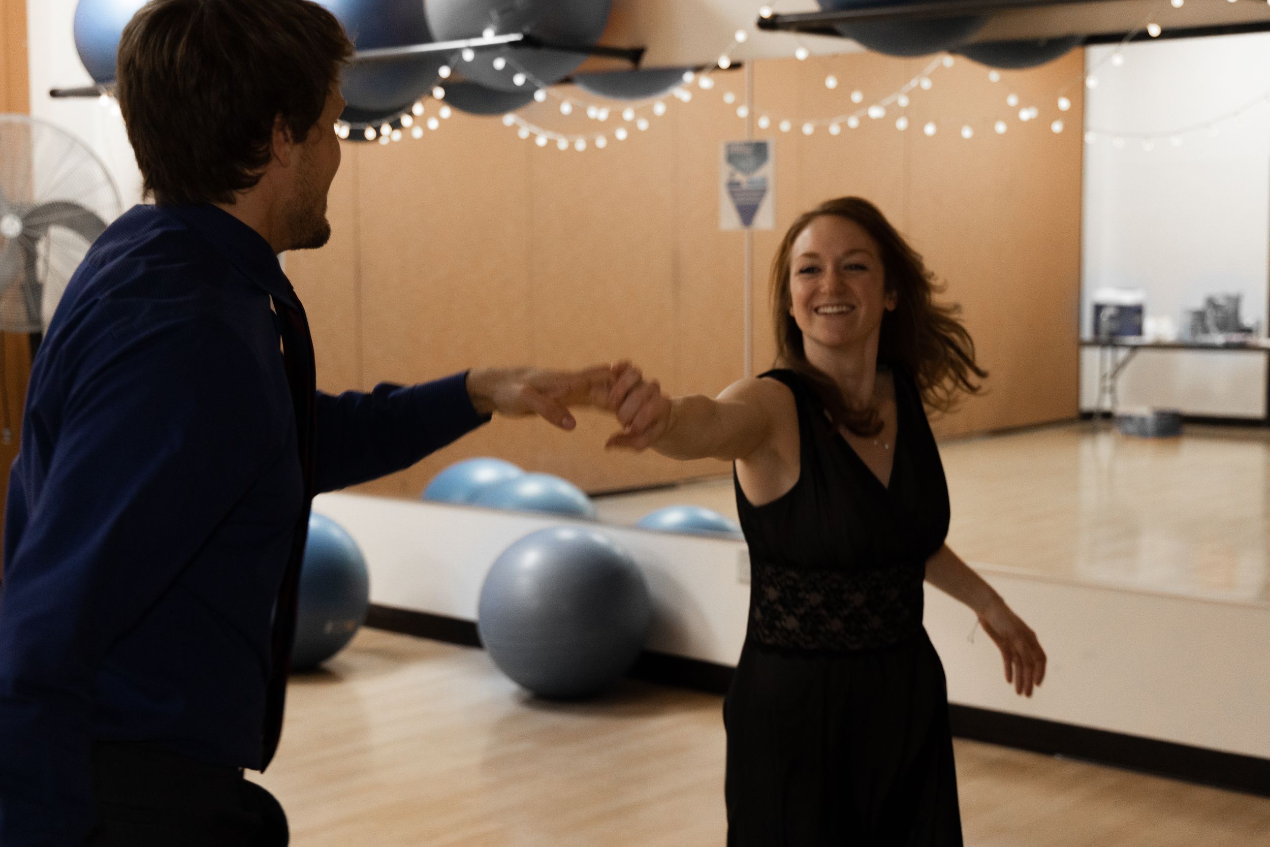 Photo of a man and woman swing dancing