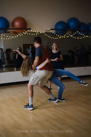 Photo of people swing dancing