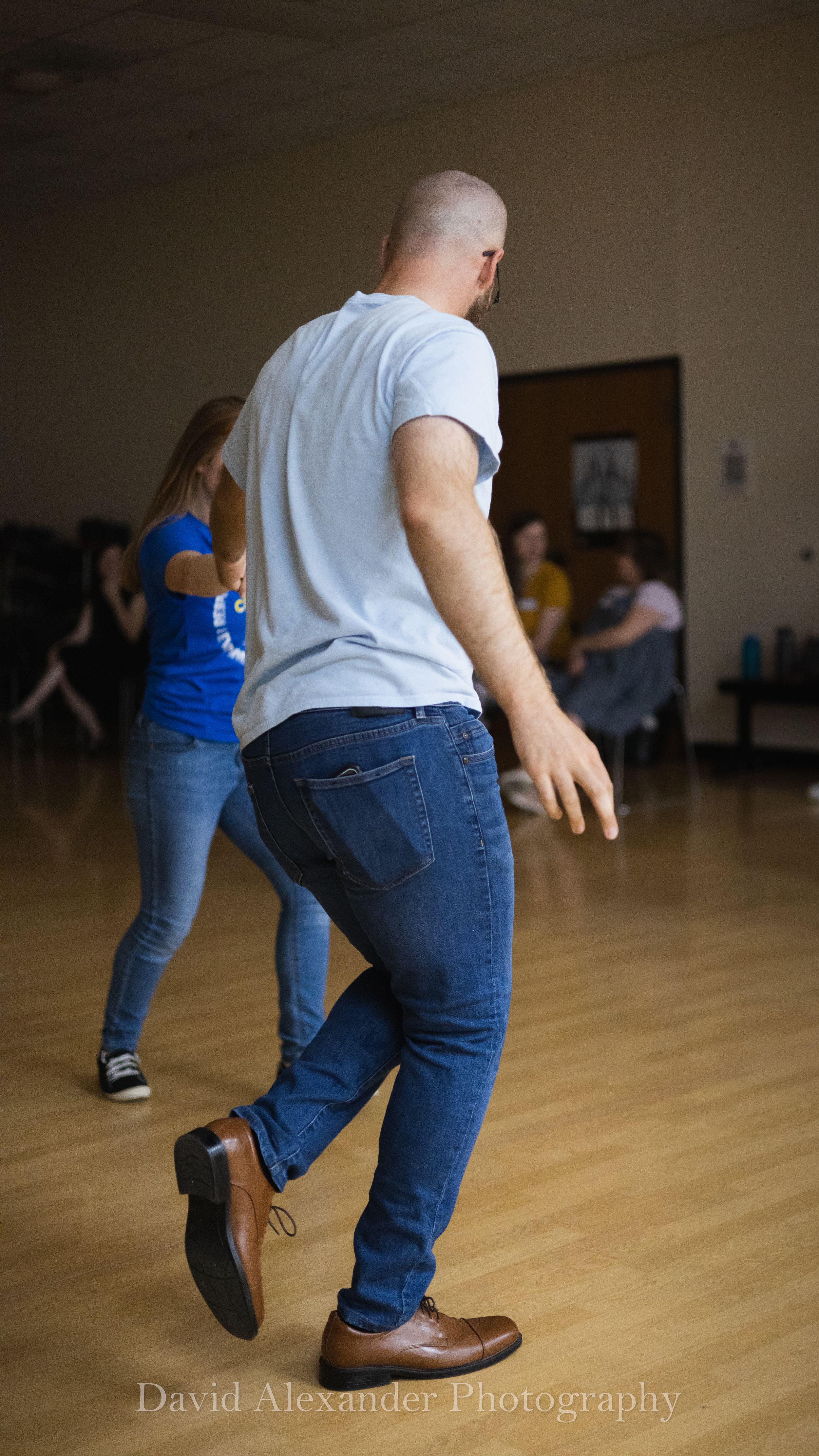 Photo of people swing dancing