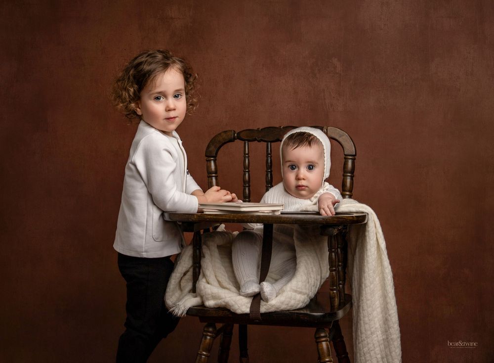 Fine art portrait of two little children.