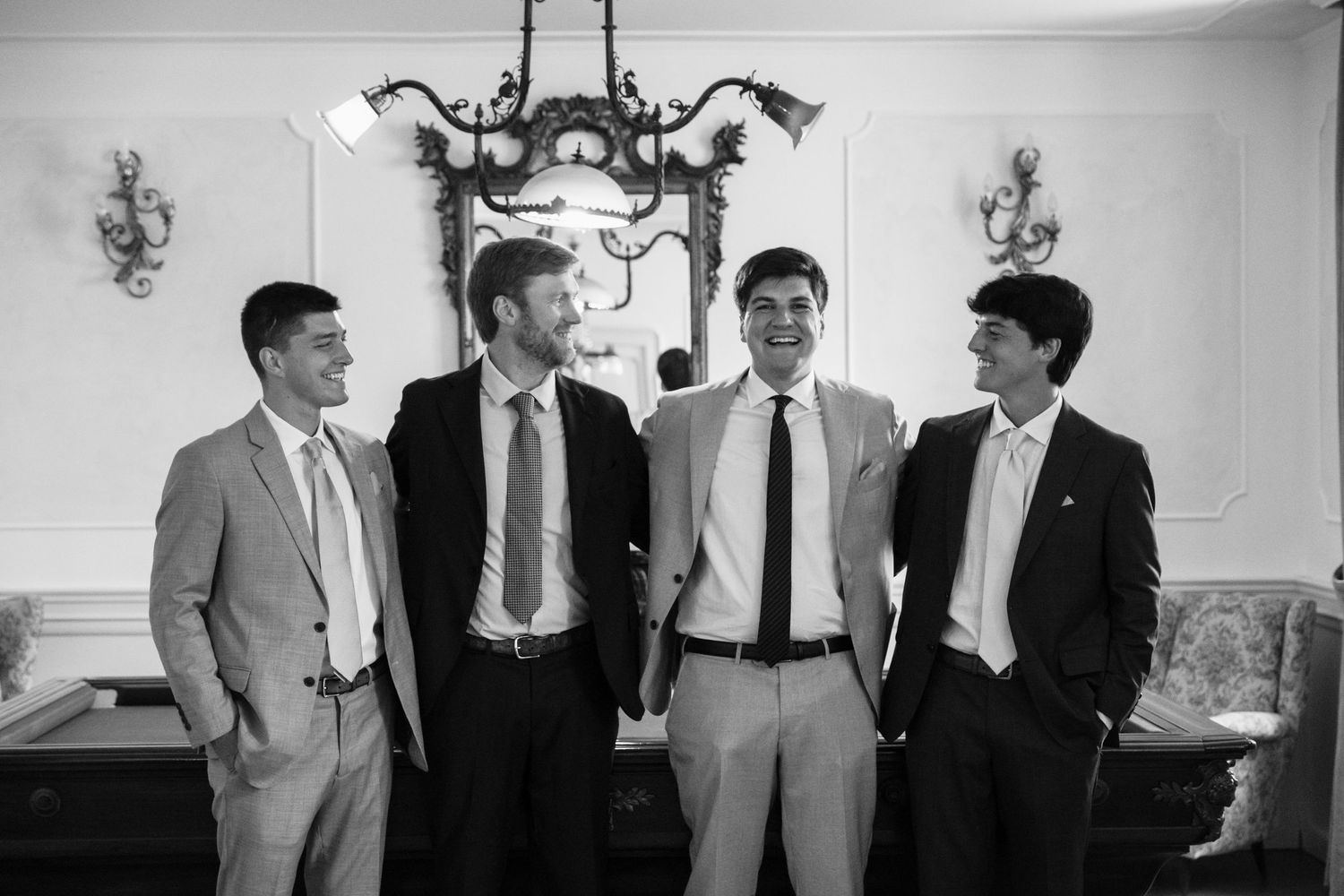 A black and white photo collage shows people in formal attire at what appears to be a wedding or celebration event.