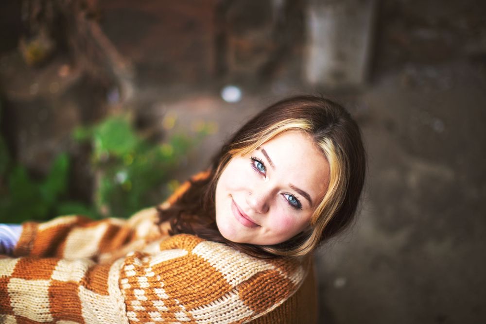 High school senior photographed near warehouses in downtown Duluth