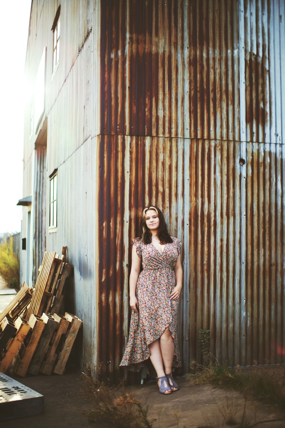 Urban senior photos in downtown Duluth with brick and metal textures