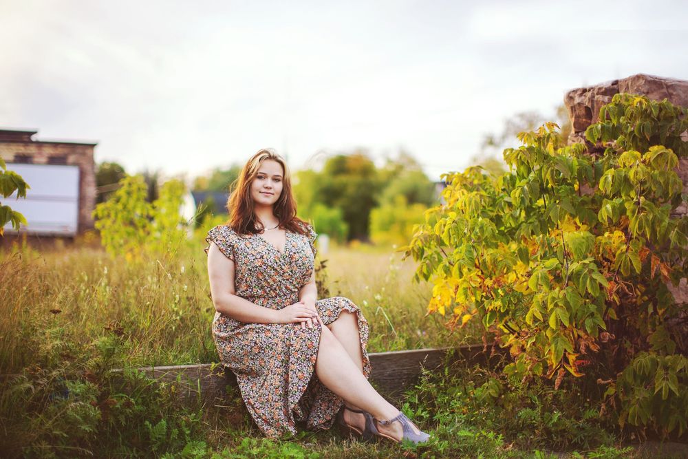 Urban senior photos in downtown Duluth with brick and metal textures