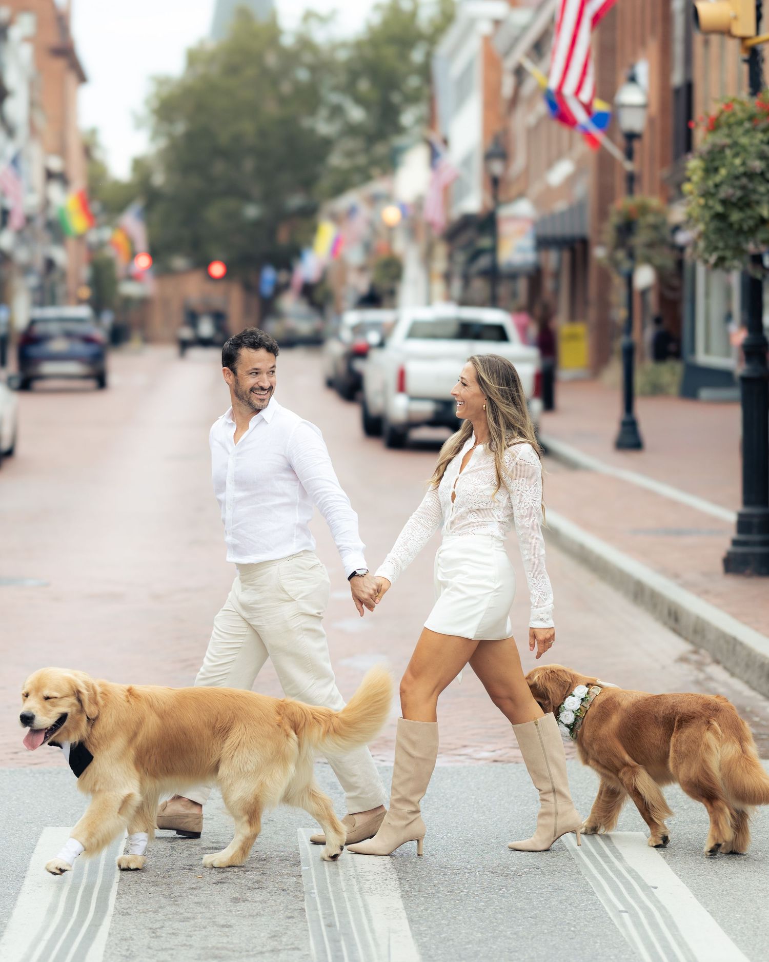 A romantic proposal moment unfolds on a tree-lined dirt path as a couple shares a special moment together.