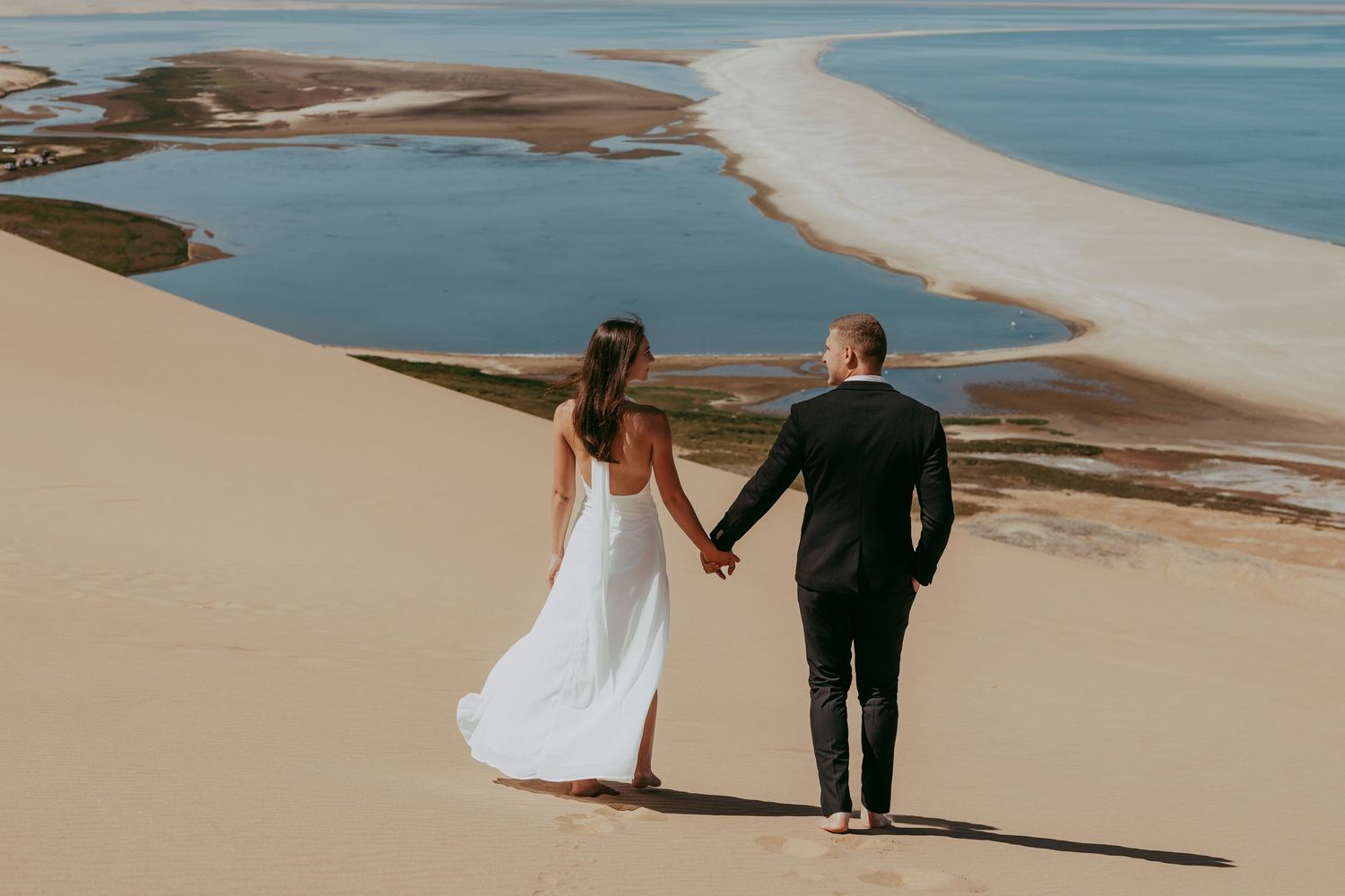 Sandwich Harbour tour where dunes meet the ocean luxury photoshoot, Couple Wedding photoshoot. Elopement.
