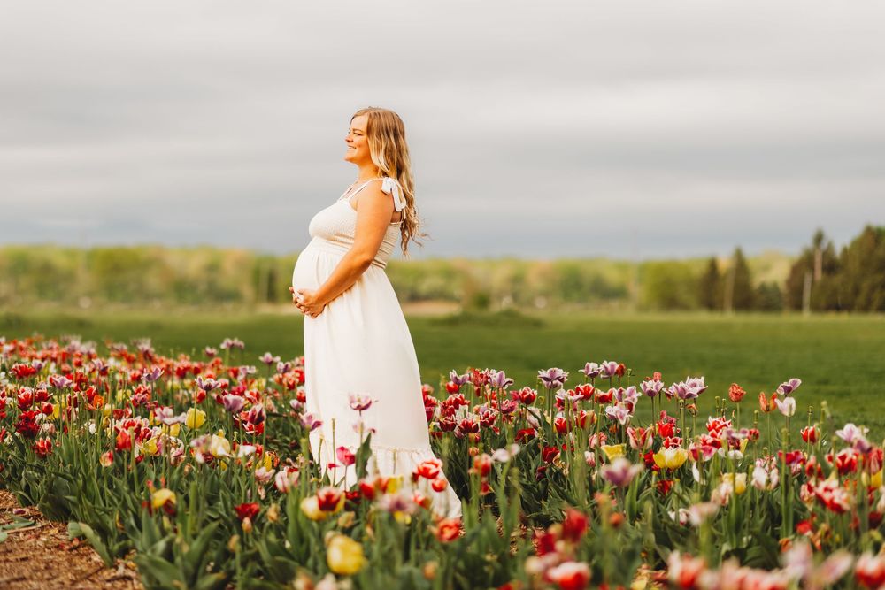 Maternity photos done in Belleville Michigan during spring with the tulips.