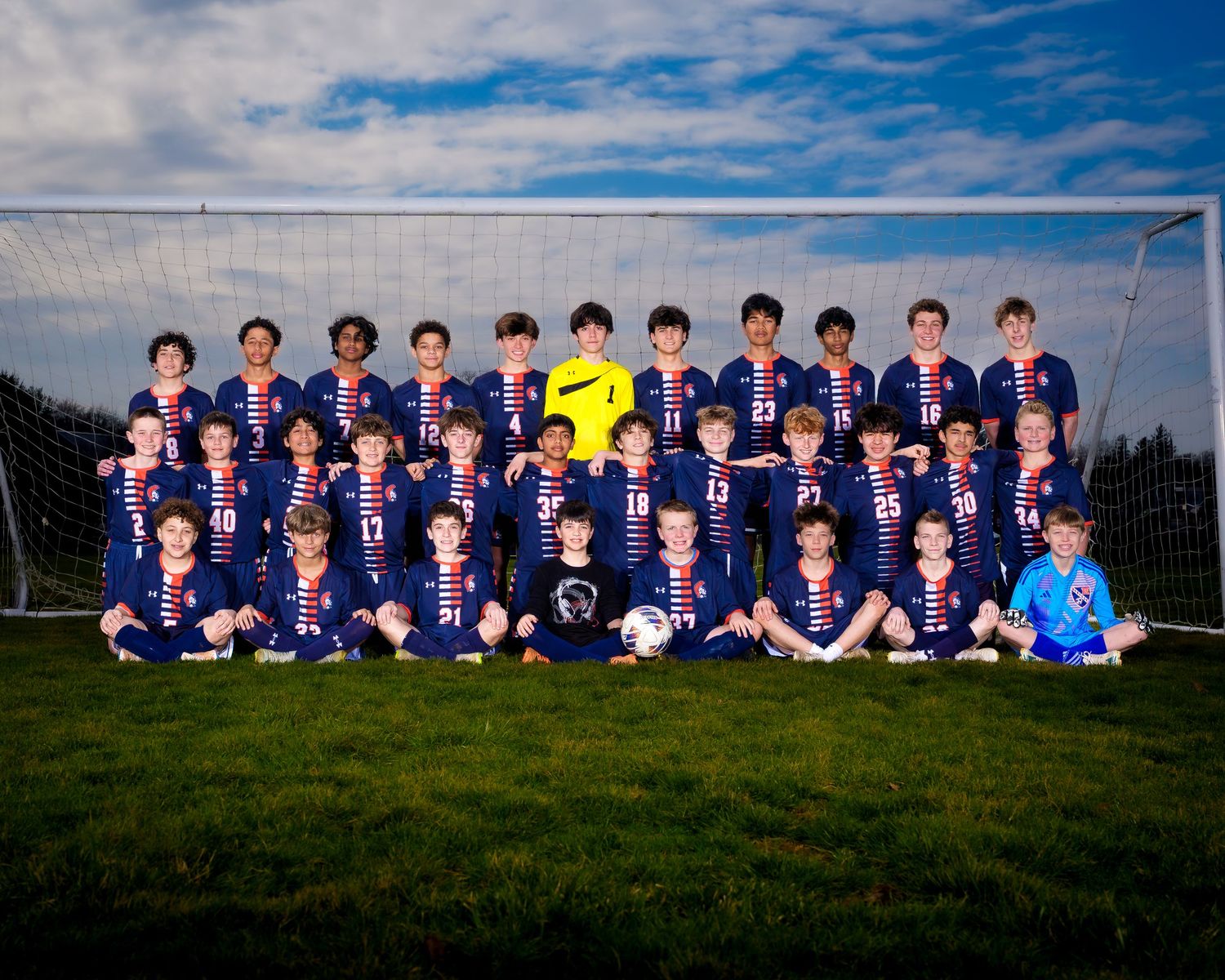 Hershey middle school soccer team in Hershey uniform, smiling  at the camera, team photo day by SportsFox Photography in Hershey PA