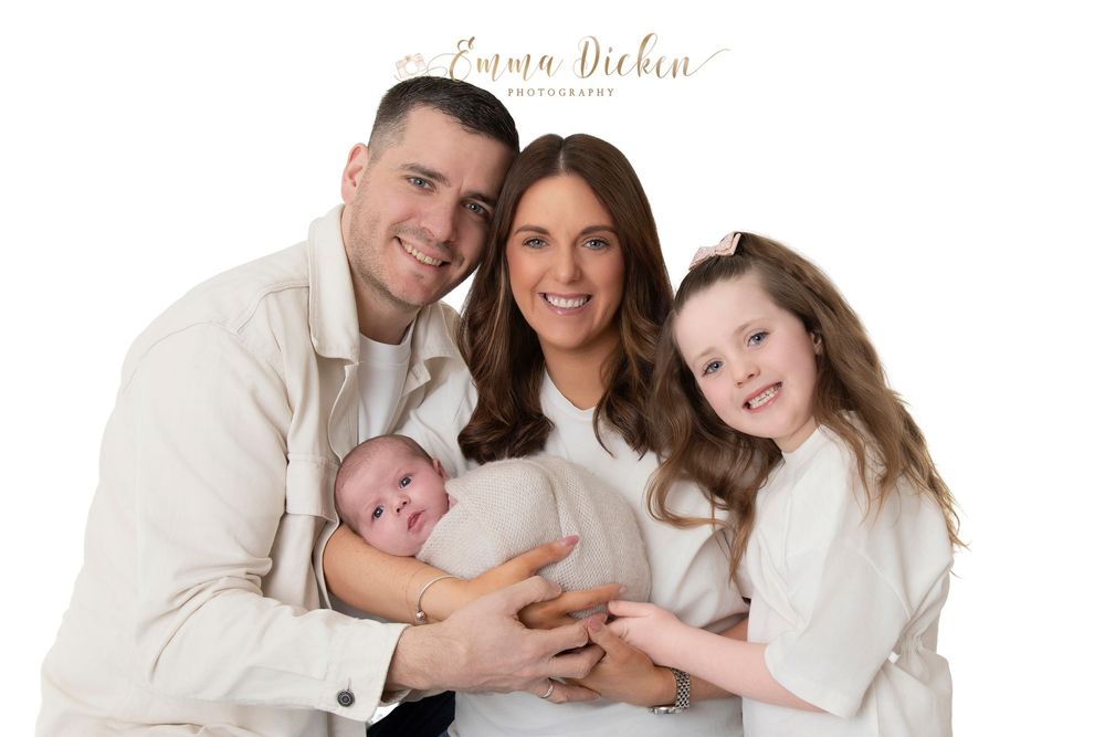 Newborn photograph with family and sister taken in a studio near Selby
