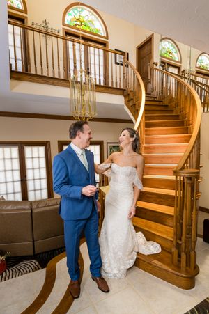 Wedding photo sequence showing couple posing on an elegant wooden staircase with arched windows.