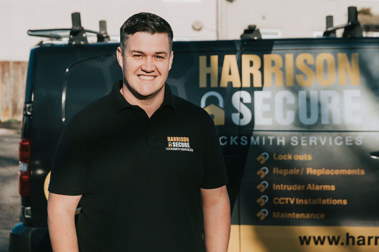 Sam from Harrison Secure with branded business van for professional headshots in Basildon.